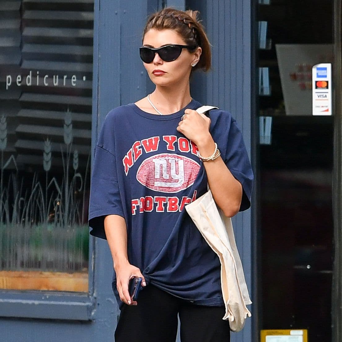It Girls Already Know That This Is Now the Chicest Fall Shoe Color Trend to Wear With Black Pants