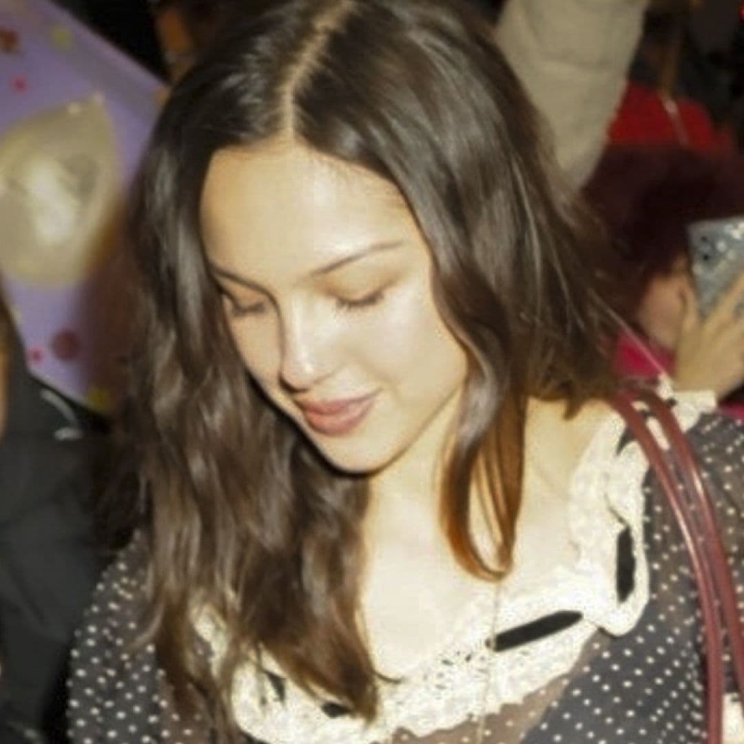  Olivia Rodrigo Teases Her 'Saturday Night Live' Host Style in a Sheer Polka-Dot Dress  