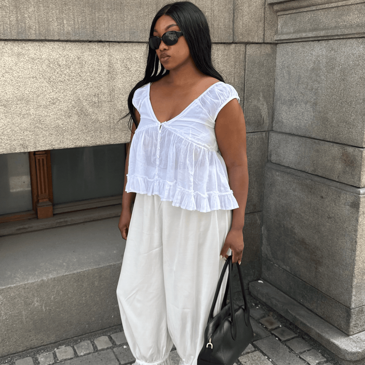  Everyone's Talking About Fall Trends, But Stylish Women Are Still Wearing This Chic Summer Staple 
