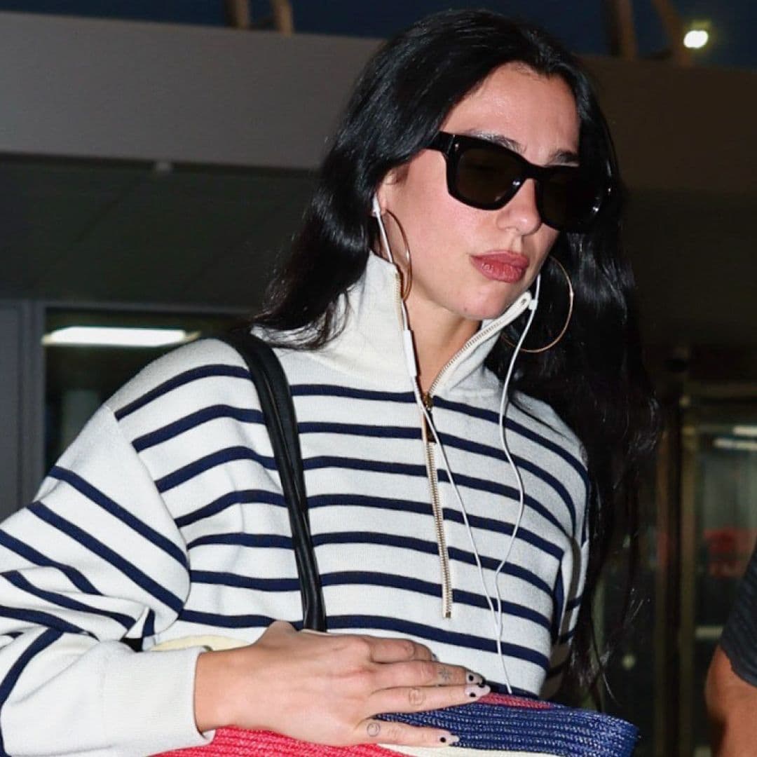 Dua Lipa Traveling With a Ludicrously Capacious Chanel Bag Is as Iconic as Airport Style Gets