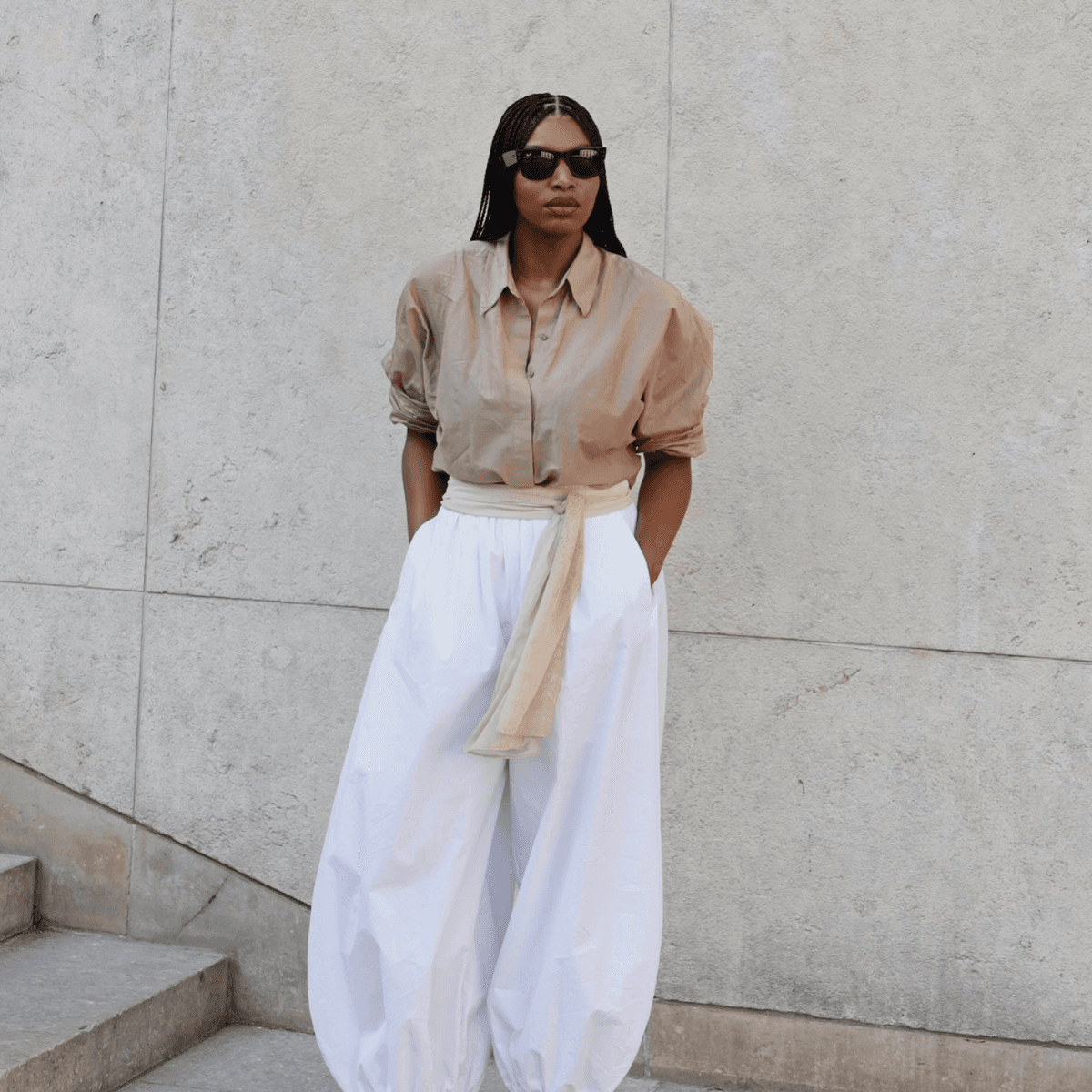 Not Linen, Not Taffeta—Chic Dressers Are All Wearing This Transitional Trouser Trend Into Autumn