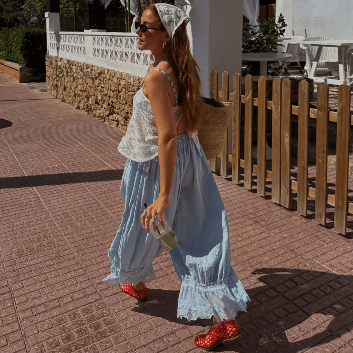  Linen Shorts, Boho Blouses and Chic Sandals—7 Easy, Elegant Outfits You'll Want to Pack For Your Next Trip 