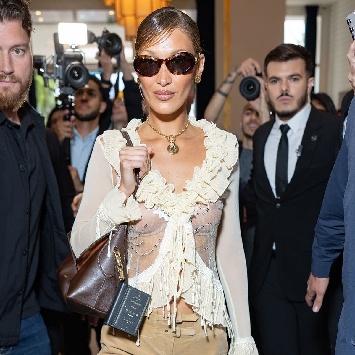 PSA: This Is the Pant-and-Heel Outfit Cool Girls Are Wearing With Coach's New It Bag