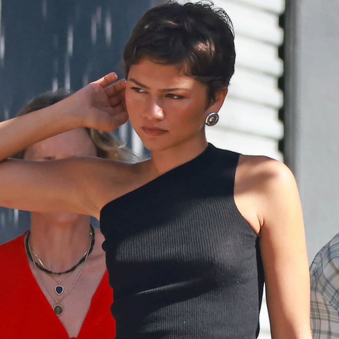 Zendaya Oozes '90s Nostalgia in Silver Jewelry, a Shoulder Bag, and 27-Year-Old Prada Boots